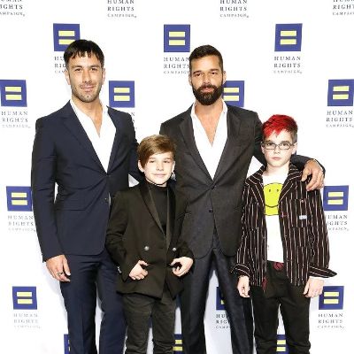 Ricky Martin and Jwan Yosef is wearing a matching suit whereas Valentino Martin and Matteo Martin are standing next to them.